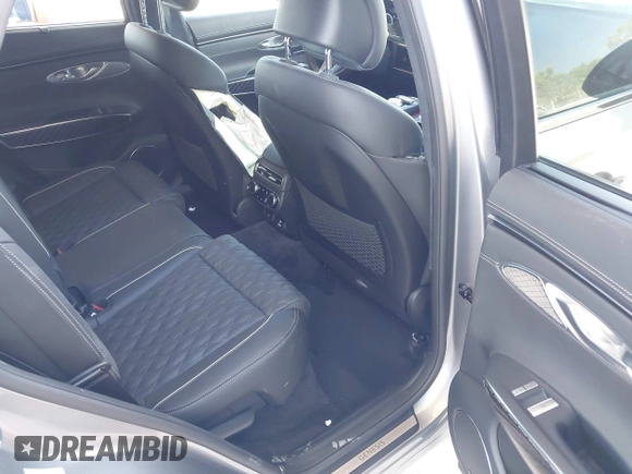 2023 Genesis GV70 Sport with VIN KMUMCDTC4PU098990, listed as a IAAI auction lot 42039386 with 32,090 mi miles and . Bid and sale history available at DreamBid. Image 8.