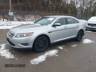 2011 Ford Taurus SEL with VIN 1FAHP2EW3BG124061, listed as a IAAI auction lot 41922716 with 241,464 mi miles and . Bid and sale history available at carsss.com. Image 2.
