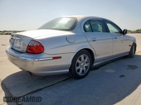 2003 Jaguar S-Type with VIN SAJEA01T43FM62477, listed as a Copart auction lot 52693085 with 109,761 mi miles and Salvage Title. Bid and sale history available at DreamBid. Image 3.