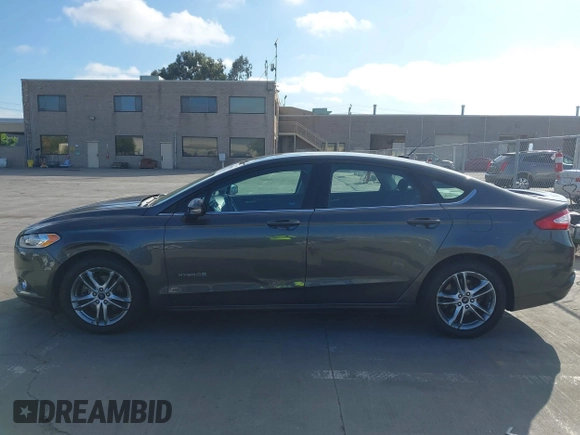 2016 Ford Fusion SE Hybrid z VIN 3FA6P0LU6GR145421, wystawiony jako IAAI lot #42650918 z przebiegiem 105 990 mil mil oraz . Historia ofert i sprzedaży dostępna na DreamBid. Obrazek 15.
