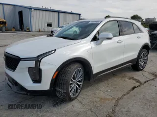 2024 Cadillac XT4 AWD Sport with VIN 1GYFZFR47RF125557, listed as a Copart auction lot 70869104 with 8,714 mi miles and Salvage title. Bid and sale history available at DreamBid. Image 1.