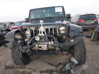 2013 Jeep Wrangler Unlimited Rubicon with VIN 1C4BJWFG2DL531203, listed as a IAAI auction lot 40729064 with 84,296 mi miles. Bid and sale history available at carsss.com. Image 12.