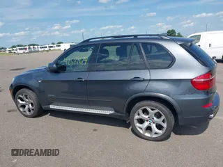 2012 BMW X5 35d with VIN 5UXZW0C56CL664575, listed as a IAAI auction lot 42559674 with 157,554 mi miles and . Bid and sale history available at DreamBid. Image 14.