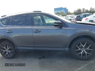 2016 Toyota RAV4 SE with VIN JTMJFREV8GJ087419, listed as a IAAI auction lot 41680315 with 93,298 mi miles and . Bid and sale history available at DreamBid. Image 13.