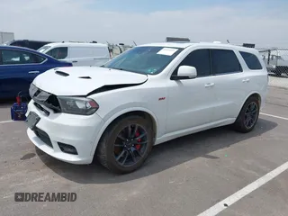 2018 Dodge Durango SRT with VIN 1C4SDJGJ2JC434843, listed as a IAAI auction lot 42434327 with 144,483 mi miles and . Bid and sale history available at DreamBid. Image 2.