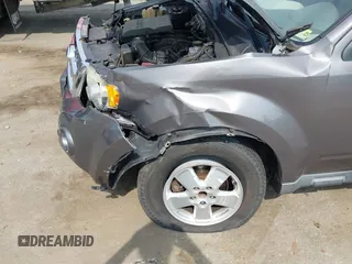 2012 Ford Escape XLT with VIN 1FMCU9DG6CKA99439, listed as a IAAI auction lot 42497707 with 186,306 mi miles and . Bid and sale history available at DreamBid. Image 6.