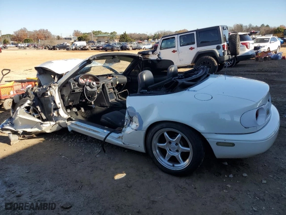 1991 Mazda MX-5 Miata Special Edition with VIN JM1NA3515M1215380, listed as a Copart auction lot 84860094 with 171,094 mi miles and Salvage Title. Bid and sale history available at carsss.com. Image 2.