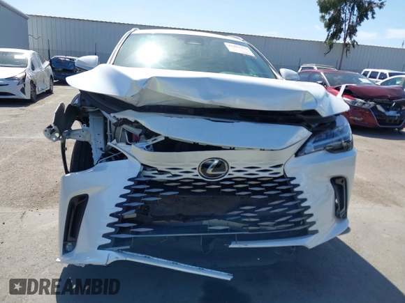 2024 Lexus RX 350h with VIN 2T2BBMCA2RC041498, listed as a IAAI auction lot 42267376 with 14,263 mi miles and . Bid and sale history available at DreamBid. Image 6.