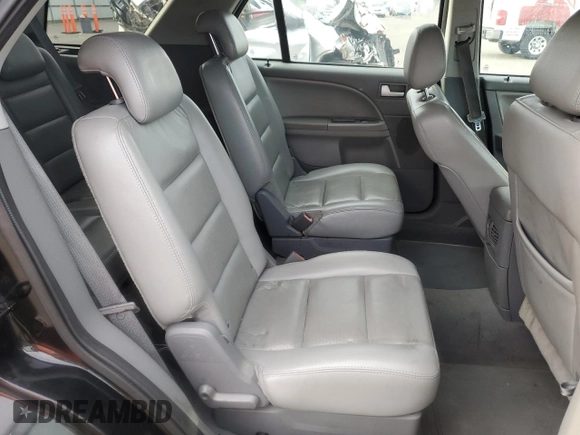 2006 Ford Freestyle SEL z VIN 1FMDK05106GA49966, wystawiony jako Copart lot #69358494 z przebiegiem 125 462 mil mil oraz Czysty tytuł • Clean title. Historia ofert i sprzedaży dostępna na DreamBid. Obrazek 11.