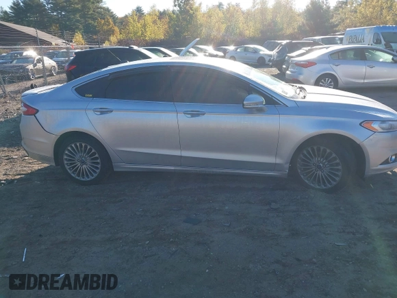 2016 Ford Fusion Titanium with VIN 3FA6P0K9XGR100723, listed as a IAAI auction lot 40627172 with 1 mi miles. Bid and sale history available at carsss.com. Image 12.