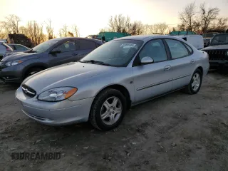 2001 Ford Taurus SEL with VIN 1FAHP56S01A149806, listed as a Copart auction lot 83083184 with 142,293 mi miles and Clean title. Bid and sale history available at DreamBid. Image 1.