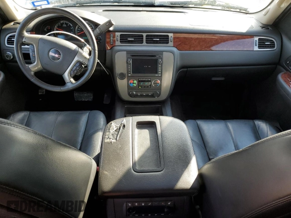 2009 GMC Yukon SLT w/4SA with VIN 1GKFC33J99R148006, listed as a Copart auction lot 88668535 with 145,088 mi miles and Salvage Title. Bid and sale history available at carsss.com. Image 8.