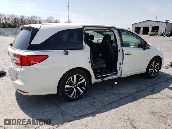 2019 Honda Odyssey Elite with VIN 5FNRL6H94KB067337, listed as a Copart auction lot 52540835 with 69,727 mi miles and Salvage Title. Bid and sale history available at DreamBid. Image 3.