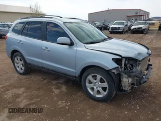 2007 Hyundai Santa Fe SE z VIN 5NMSH73E87H051418, wystawiony jako IAAI lot #41606640 z przebiegiem 185 407 mil mil oraz . Historia ofert i sprzedaży dostępna na DreamBid. Obrazek 1.