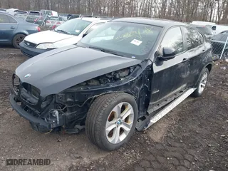 2011 BMW X6 35i with VIN 5UXFG2C58BLX08487, listed as a IAAI auction lot 41627394 with 999,999 mi miles. Bid and sale history available at carsss.com. Image 2.