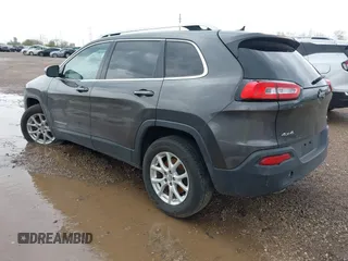 2014 Jeep Cherokee Altitude with VIN 1C4PJMCB2EW181848, listed as a IAAI auction lot 41638004 with 175,813 mi miles. Bid and sale history available at carsss.com. Image 3.
