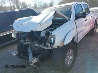 2014 Toyota Tacoma with VIN 5TFLU4EN1EX103052, listed as a IAAI auction lot 41653270 with 121,656 mi miles. Bid and sale history available at carsss.com. Image 6.