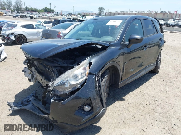 2016 Mazda CX-5 Grand Touring z VIN JM3KE2DY6G0900005, wystawiony jako IAAI lot #42311162 z przebiegiem 80 758 mil mil oraz . Historia ofert i sprzedaży dostępna na DreamBid. Obrazek 2.