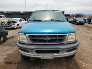 1997 Ford F-150 z VIN 1FTDF1829VKA55991, wystawiony jako Copart lot #59338705 z przebiegiem 160 202 mil mil oraz Czysty tytuł • Clean title. Historia ofert i sprzedaży dostępna na DreamBid. Obrazek 5.