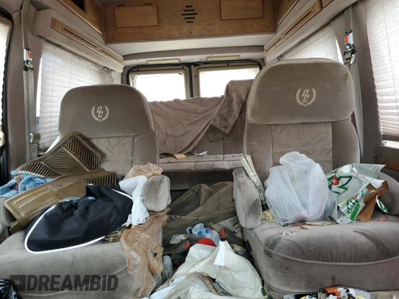 1999 Ford Econoline Cargo with VIN 1FDRE14W5XHB75137, listed as a Copart auction lot 53663605 with 147,149 mi miles and Salvage Title. Bid and sale history available at carsss.com. Image 10.