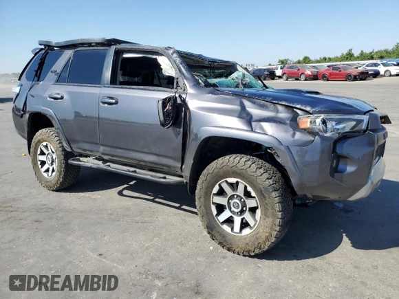 2021 Toyota 4Runner TRD Off Road Premium with VIN JTERU5JR5M5896502, listed as a Copart auction lot 60059305 with 64,916 mi miles and Salvage title. Bid and sale history available at DreamBid. Image 4.