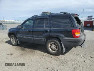 1999 Jeep Grand Cherokee Limited with VIN 1J4GW68N4XC679841, listed as a Copart auction lot 59760015 with 155,366 mi miles and Salvage title. Bid and sale history available at DreamBid. Image 2.