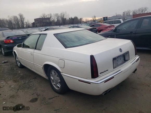 1999 Cadillac Eldorado with VIN 1G6EL12Y5XU600699, listed as a Copart auction lot 88164505 with 140,075 mi miles and Salvage Title. Bid and sale history available at carsss.com. Image 2.