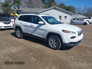 2015 Jeep Cherokee Latitude with VIN 1C4PJMCS8FW624375, listed as a IAAI auction lot 41848679 with 148,130 mi miles and . Bid and sale history available at DreamBid. Image 1.
