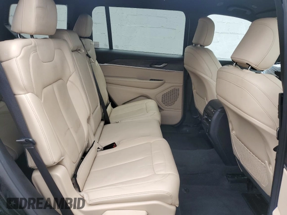 2023 Jeep Grand Cherokee Limited z VIN 1C4RJKBG8P8728476, wystawiony jako Copart lot #57998385 z przebiegiem 21 440 mil mil oraz Szkoda całkowita • Salvage title. Historia ofert i sprzedaży dostępna na DreamBid. Obrazek 11.