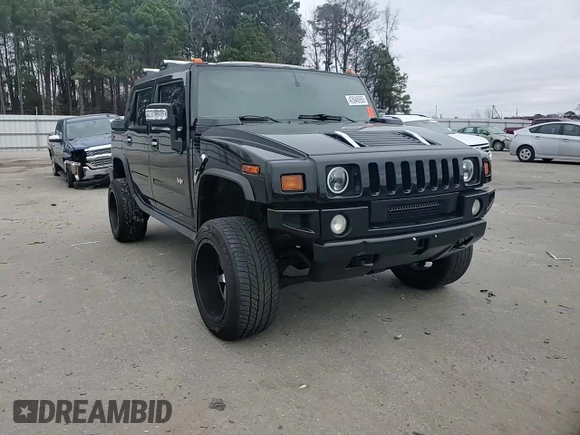 2005 Hummer H2 SUT z VIN 5GRGN22UX5H120312, wystawiony jako Copart lot #43948955 z przebiegiem Nie podano mil oraz Szkoda całkowita • Salvage title. Historia ofert i sprzedaży dostępna na DreamBid. Obrazek 10.