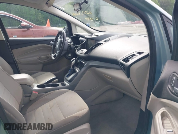 2013 Ford C-Max SE z VIN 1FADP5AU4DL511362, wystawiony jako IAAI lot #42073682 z przebiegiem 160 960 mil mil oraz . Historia ofert i sprzedaży dostępna na DreamBid. Obrazek 5.