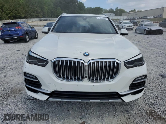 2021 BMW X5 xDrive40i z VIN 5UXCR6C07M9H21128, wystawiony jako Copart lot #54084915 z przebiegiem 26 966 mil mil oraz Szkody całkowita. Historia ofert i sprzedaży dostępna na DreamBid. Obrazek 5.