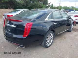 2013 Cadillac XTS Luxury with VIN 2G61R5S32D9246125, listed as a IAAI auction lot 42261263 with 89,390 mi miles and . Bid and sale history available at DreamBid. Image 4.