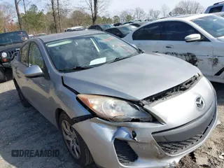 2012 Mazda Mazda3 i Sport with VIN JM1BL1UF5C1574631, listed as a IAAI auction lot 41801680 with 135,364 mi miles. Bid and sale history available at carsss.com. Image 1.