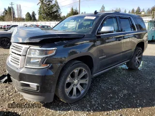 2015 Chevrolet Tahoe LTZ z VIN 1GNSKCKC5FR638011, wystawiony jako Copart lot #49269395 z przebiegiem 127 427 mil mil oraz Szkoda całkowita • Salvage title. Historia ofert i sprzedaży dostępna na DreamBid. Obrazek 1.