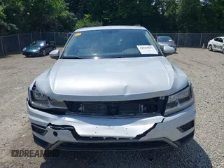 2018 Volkswagen Tiguan SEL z VIN 3VV2B7AX6JM195125, wystawiony jako IAAI lot #42523047 z przebiegiem 73 926 mil mil oraz . Historia ofert i sprzedaży dostępna na DreamBid. Obrazek 13.