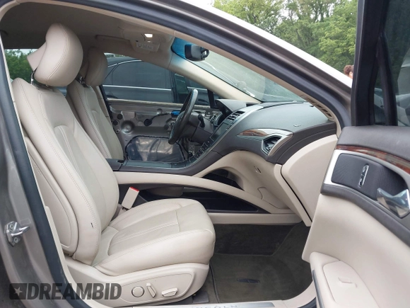 2016 Lincoln MKZ Hybrid with VIN 3LN6L2LU3GR629124, listed as a IAAI auction lot 42285383 with 116,196 mi miles and . Bid and sale history available at DreamBid. Image 5.