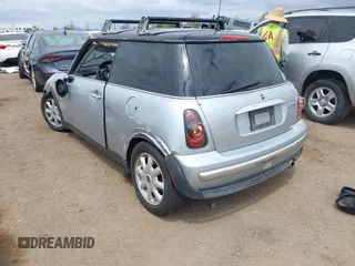 2004 MINI Hardtop with VIN WMWRC33434TJ57506, listed as a IAAI auction lot 42117581 with 148,483 mi miles and . Bid and sale history available at DreamBid. Image 3.