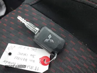2018 Mitsubishi Outlander Sport ES 2.0 with VIN JA4AP3AU4JU011803, listed as a IAAI auction lot 42016794 with 120,544 mi miles. Bid and sale history available at carsss.com. Image 11.