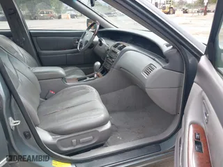 2003 Toyota Avalon XL with VIN 4T1BF28B83U318529, listed as a IAAI auction lot 42058121 with 171,889 mi miles. Bid and sale history available at carsss.com. Image 5.