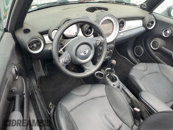 2012 MINI Convertible with VIN WMWZN3C50CT134069, listed as a Copart auction lot 56524155 with 106,480 mi miles and Clean title. Bid and sale history available at DreamBid. Image 8.