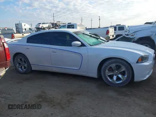 2014 Dodge Charger SE with VIN 2C3CDXBG6EH340877, listed as a IAAI auction lot 41337234 with 181,870 mi miles. Bid and sale history available at carsss.com. Image 13.