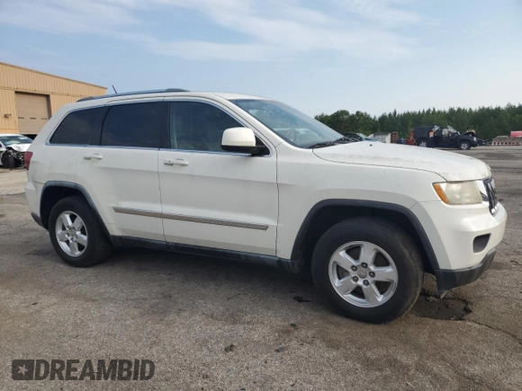2011 Jeep Grand Cherokee Laredo with VIN 1J4RR4GG2BC581987, listed as a Copart auction lot 64072515 with 213,607 mi miles and Clean title. Bid and sale history available at DreamBid. Image 4.
