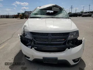 2018 Dodge Journey SXT with VIN 3C4PDDBG6JT141759, listed as a Copart auction lot 53974645 with 142,335 mi miles and Salvage title. Bid and sale history available at DreamBid. Image 5.