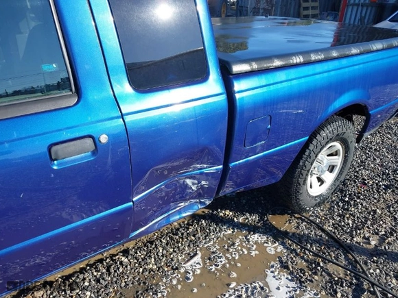 2011 Ford Ranger XLT with VIN 1FTKR4EE3BPB03532, listed as a IAAI auction lot 41723661 with 219195 miles. Bid and sale history available at carsss.com. Image 6.