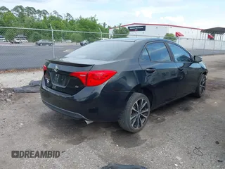 2017 Toyota Corolla L with VIN 2T1BURHE6HC763157, listed as a IAAI auction lot 42241374 with 109,046 mi miles and . Bid and sale history available at DreamBid. Image 4.