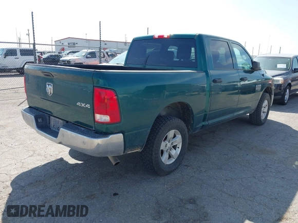 2022 Ram 1500 Tradesman with VIN 3C6RR7KG4NG224804, listed as a IAAI auction lot 41922878 with 125,963 mi miles and . Bid and sale history available at DreamBid. Image 4.