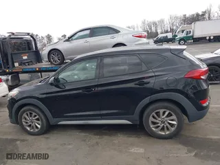 2017 Hyundai Tucson SE Plus with VIN KM8J33A49HU584557, listed as a IAAI auction lot 41853951 with 105,602 mi miles. Bid and sale history available at carsss.com. Image 14.