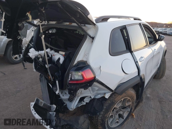 2021 Jeep Cherokee Trailhawk with VIN 1C4PJMBX4MD153086, listed as a IAAI auction lot 41132030 with 56,367 mi miles and . Bid and sale history available at DreamBid. Image 17.