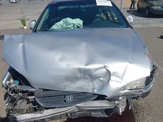2000 Honda Accord EX z VIN 1HGCG2257YA010383, wystawiony jako IAAI lot #42278620 z przebiegiem 170 757 mil mil oraz . Historia ofert i sprzedaży dostępna na DreamBid. Obrazek 10.